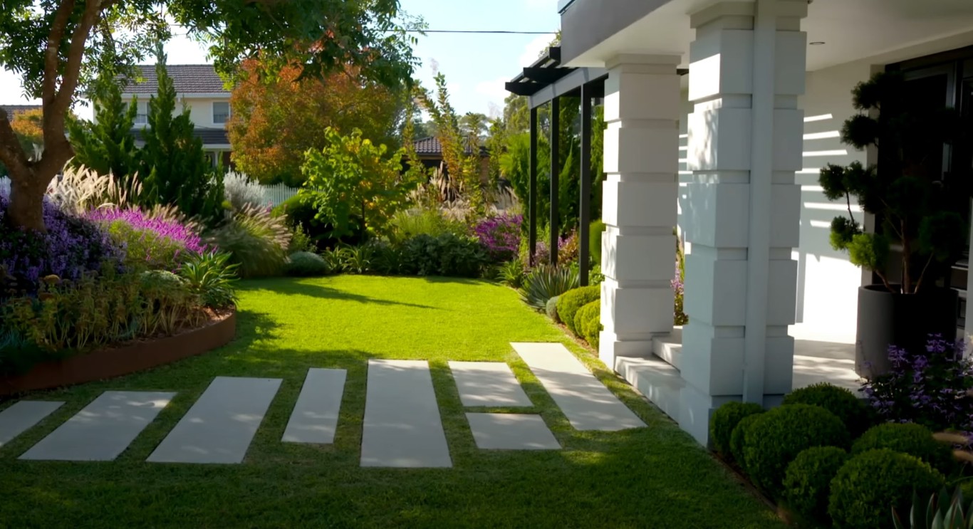 Modern landscape design with clean lines and vibrant flowering plants in El Centro, CA